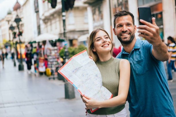 istock Couple tourists taking a selfie 1254813149