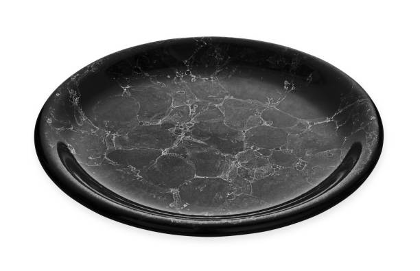 istock Black marble plate, Empty ceramic plate with marble texture, isolated on white background with clipping path, Side view 1254813274