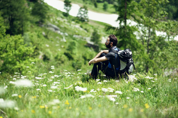 istock A man hikes in the mountains after the lockdown 1254816080
