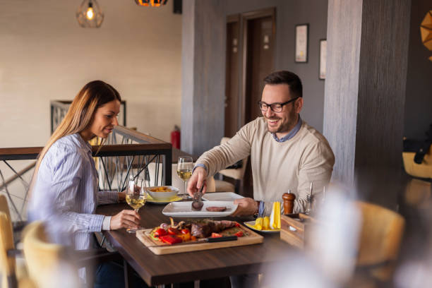 istock Couple on a date in restaurant 1254816519