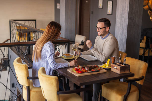 istock Couple eating lunch at restaurant 1254816567