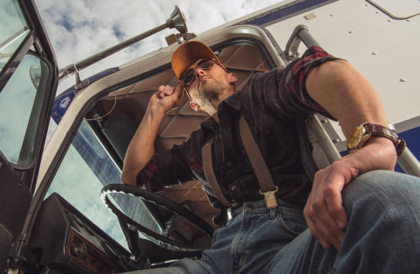 istock Truck Driver Taking Break At Rest Stop. 1254818175