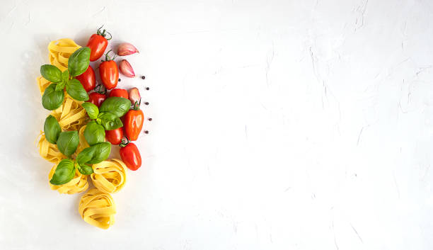 istock Italian pasta ingredients preparing to cook. 1254818233