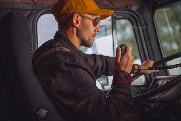 istock Truck Driver Talking On Radio. 1254819437