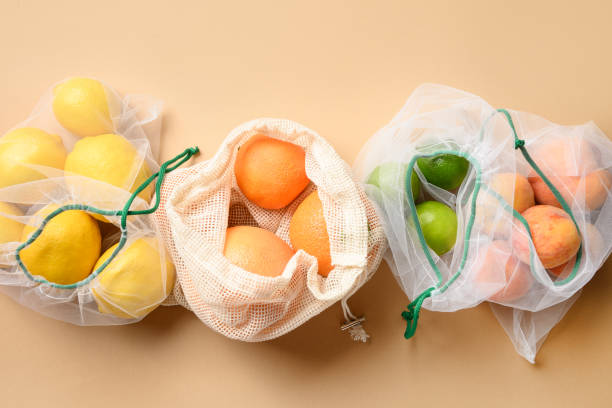 istock Fresh fruits in reusable eco mesh bags 1254819485