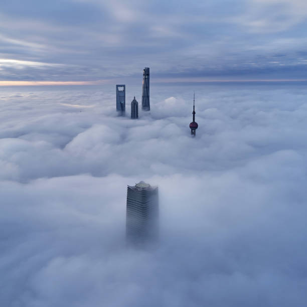 istock Aerial View of Shanghai Skyline on Thick Cloud, China 1254822366