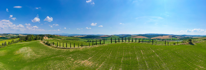 Beautiful rolling fields and cypress trees in Tuscany Italy