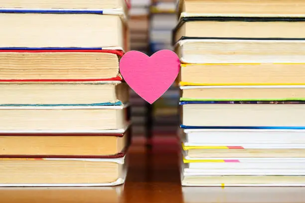 Photo of A small heart and books