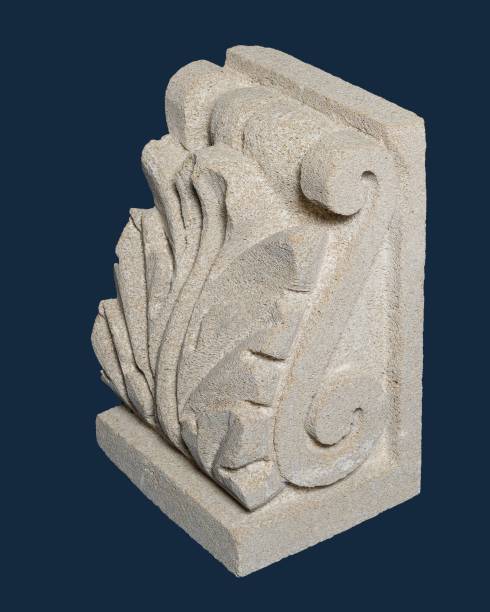 istock Plaster graceful decorations on the columns, dark background 1254831316
