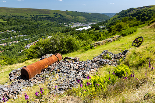 Abandoned Victorian era industrial boilers and flywheels from a long since closed ironworks.  Ebbw Vale, South Wales, UK