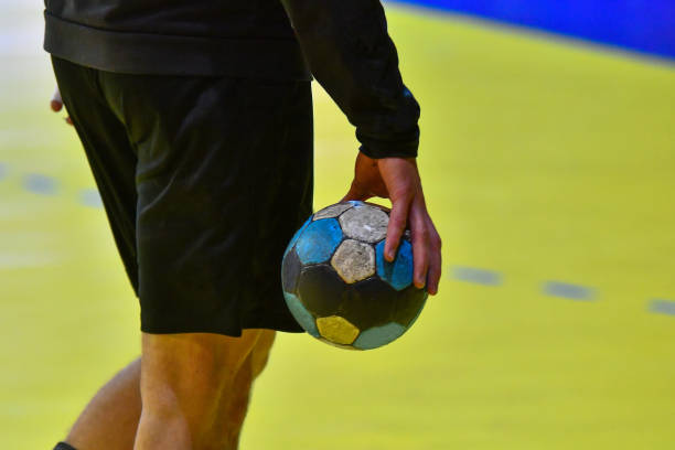 istock Handball player holding a ball 1254831590