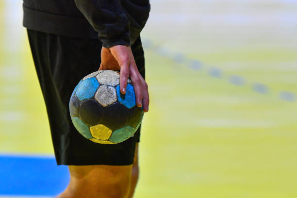 istock Handball player holding a ball 1254831749