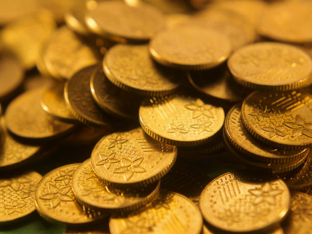 istock heap of coins 1254836670
