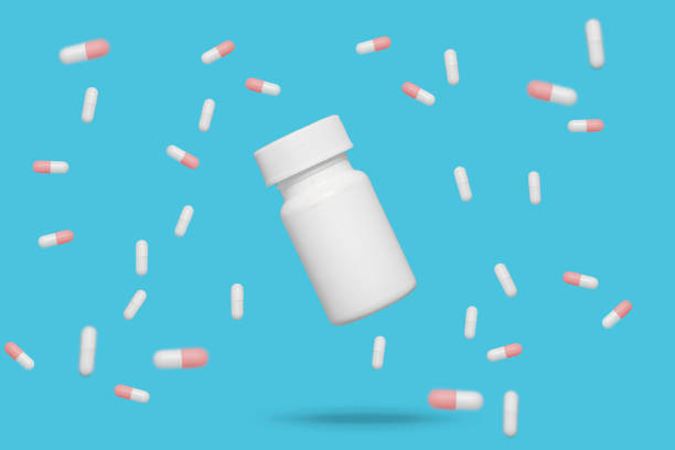 istock Red and white medicine floating around closed pill bottle 1254840892