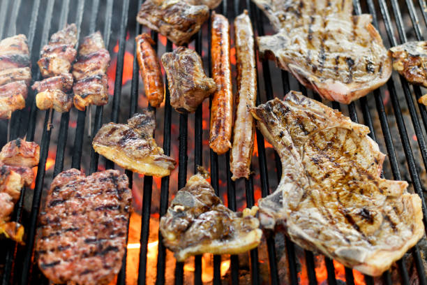 istock Assortment of different meat grilling on a fire 1254840895