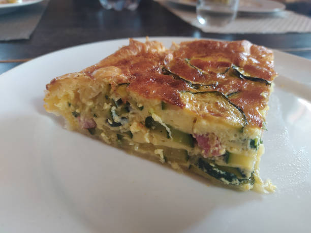 istock savoury pie with bacon and zucchini 1254845175