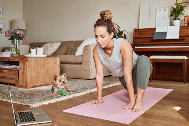 istock Taking on a brand new yoga challenge 1254852653