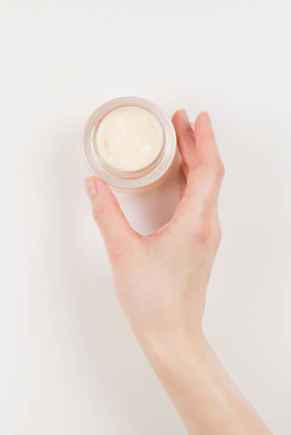 istock Hand cream isolated on white background. 1254852676