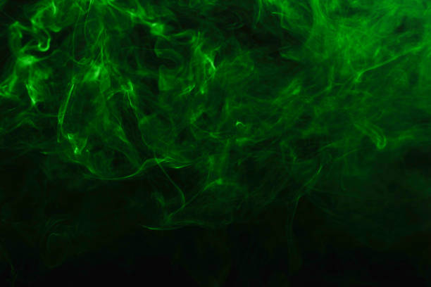 istock Green steam on a black background. 1254852692