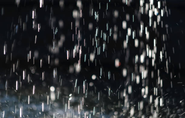 istock splashing water droplets in motion 1254853439