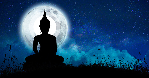 The Buddha meditated among many stars and a large moon.
