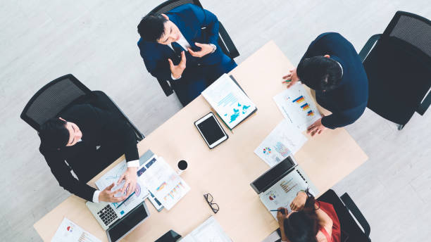 istock Business people group meeting shot from top view 1254856454