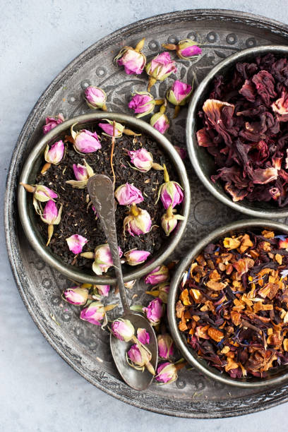 istock Tea concept. Different kinds of tea in bowls 1254857205