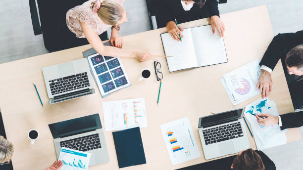 istock Business people group meeting shot from top view 1254858209