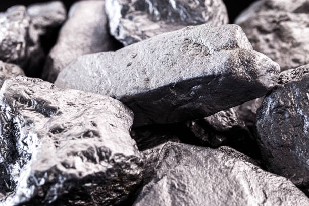 istock Silicon is a chemical element used in chips, building material and industry. Platinum rough stone, industrial use. 1254860105