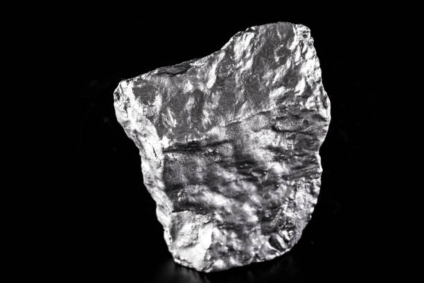 istock Silicon is a chemical element used in chips, building material and industry. Platinum rough stone, industrial use. 1254860169