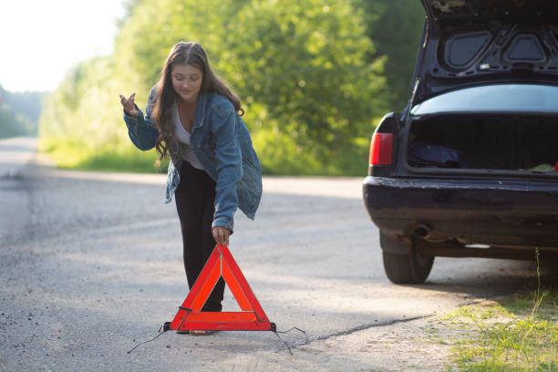 istock A girl with an emergency sign 1254862107