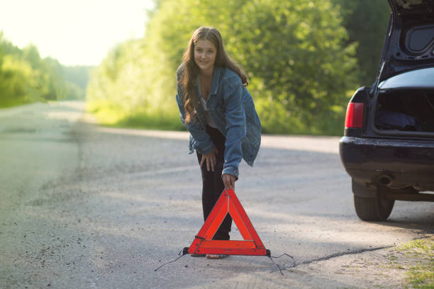istock A girl with an emergency sign 1254862121