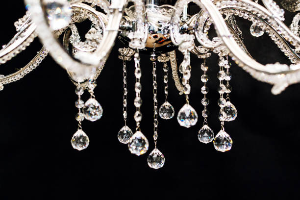 istock Chandelier with decorative diamonds on a dark background 1254863768