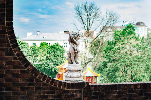 Statue of a boy on a stone wall in Kirov, Kirov Oblast, Russia