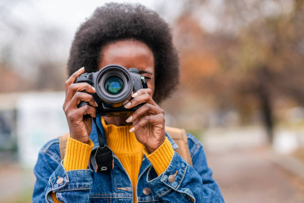 istock Female tourist taking a photo. 1254866765