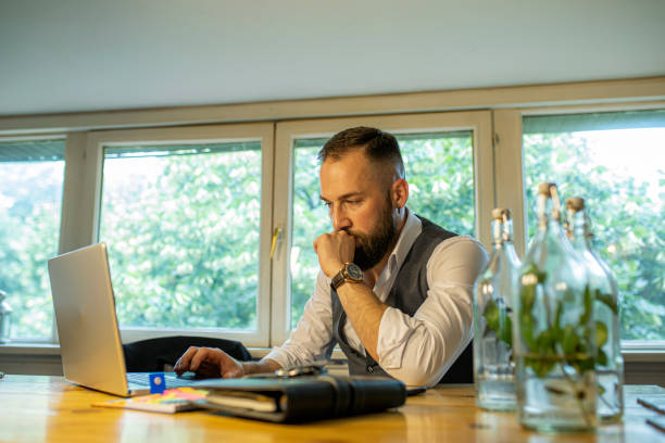istock Businessman working on laptop 1254867165