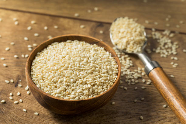 istock Raw Organic Dry White Sesame Seeds 1254867222