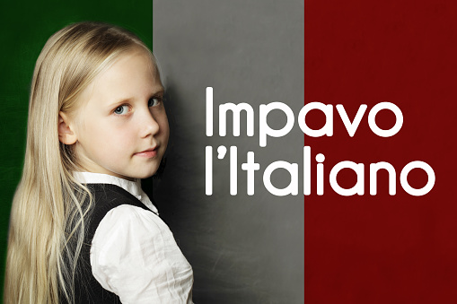 Thinking child girl student against the Italy flag background. Italian concept with inscription learn Italian on Italian language