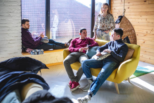 istock Group of friends sitting their work relaxation room 1254869352