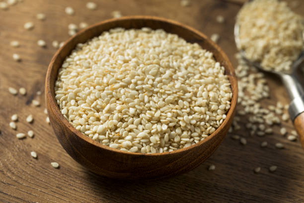 istock Raw Organic Dry White Sesame Seeds 1254869617
