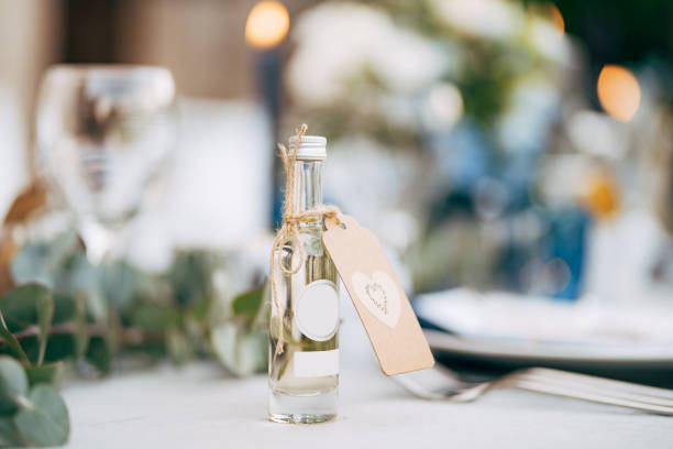A little gift bottle of alcohol on the wedding table.