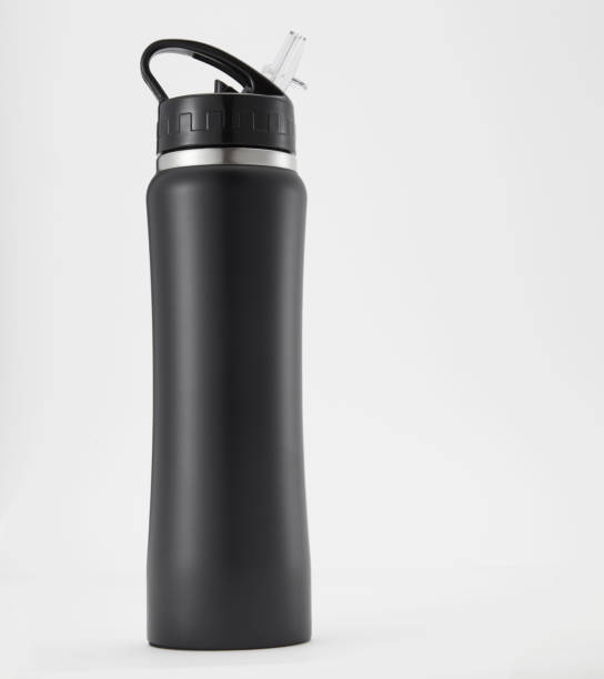 istock Full length black aluminium waterbottle. Isolated on white background. 1254872990