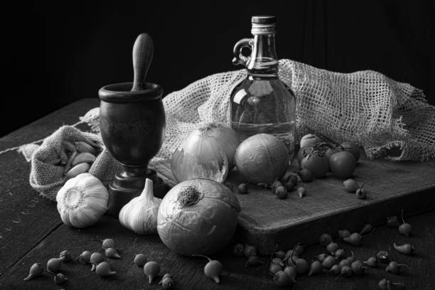 istock Wooden mortar and spices in a rustic arrangement on wood. selective focus 1254875415