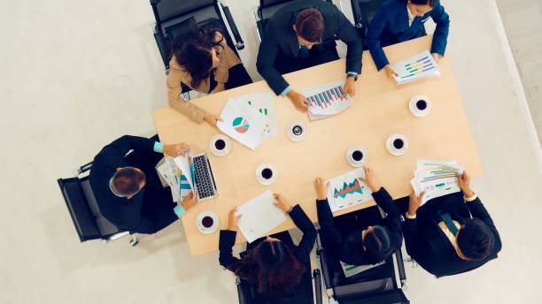 istock Business people group meeting shot from top view 1254879832