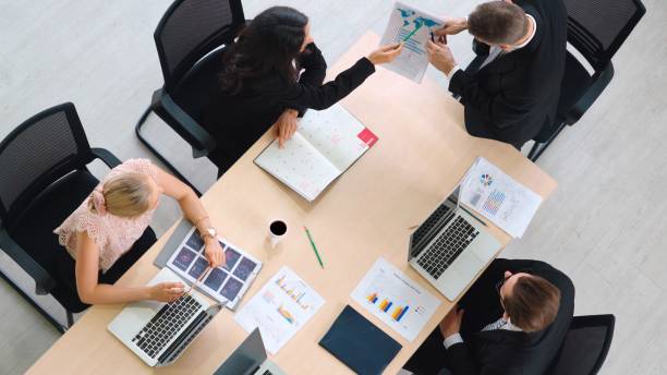 istock Business people group meeting shot from top view 1254883122