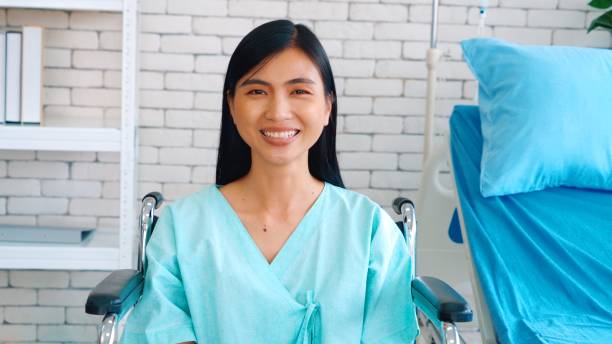 istock Happy patient getting well improvement at hospital 1254883324