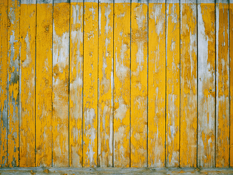 Old plank wooden yellow texture background, full frame