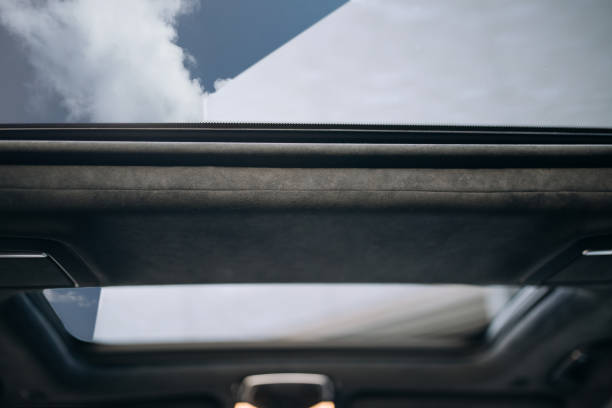 istock Panoramic glass sun roof in the car 1254886654