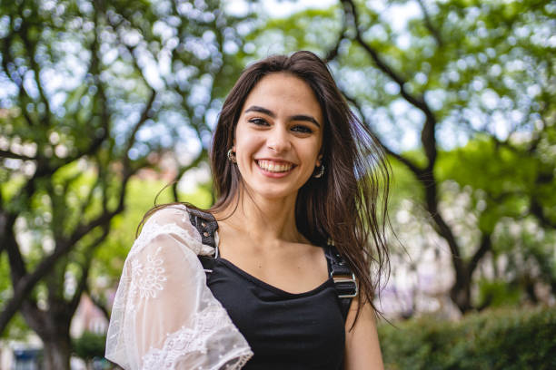 istock Cute cheerful Hispanic young woman 1254891911