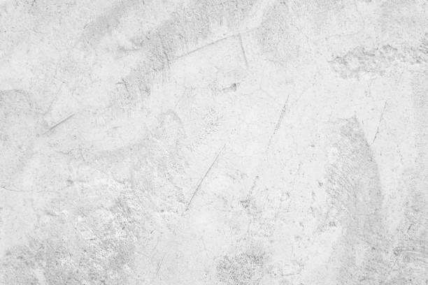 istock White concrete wall for interior or outdoor exposed surface polished. Cement have sand and stone of tone vintage, Grey natural concrete loft patterns old antique, design work floor texture background. 1254892949